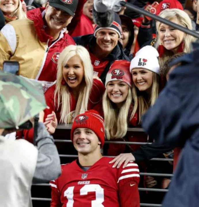 Jenna Brandt with Brock Purdy and family in 49ers gear