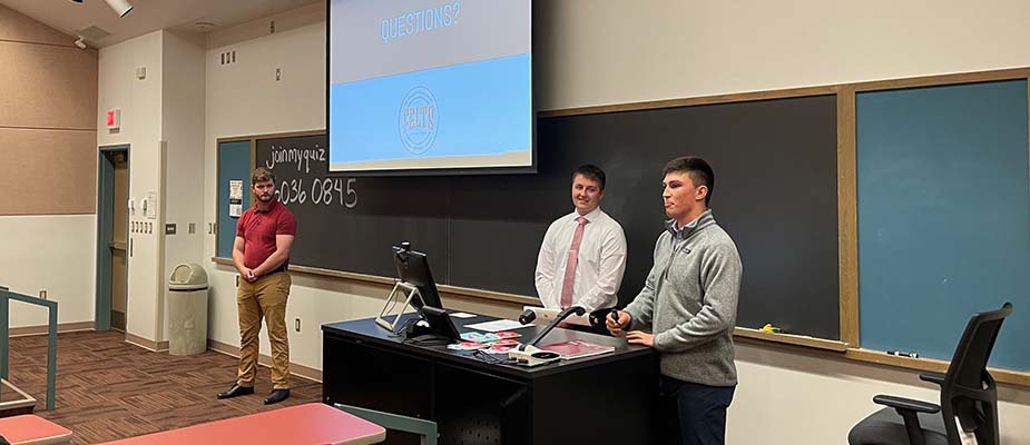 Students presenting for a managerial course