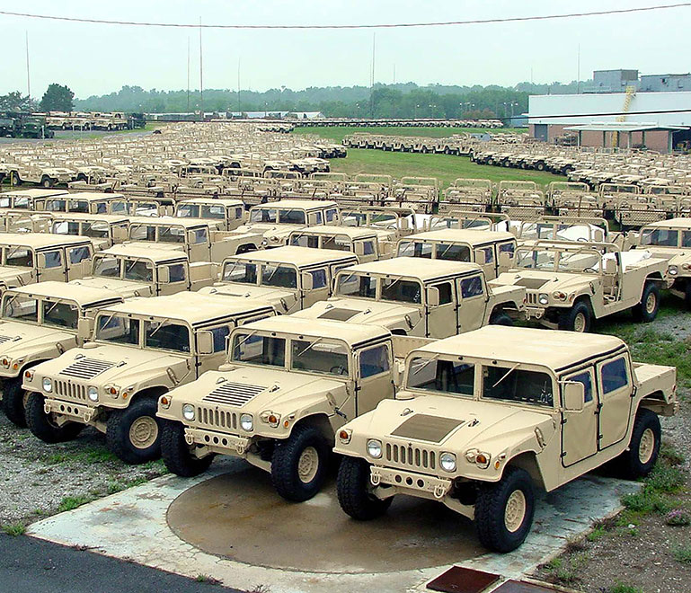 Rows and rows of Army humvees