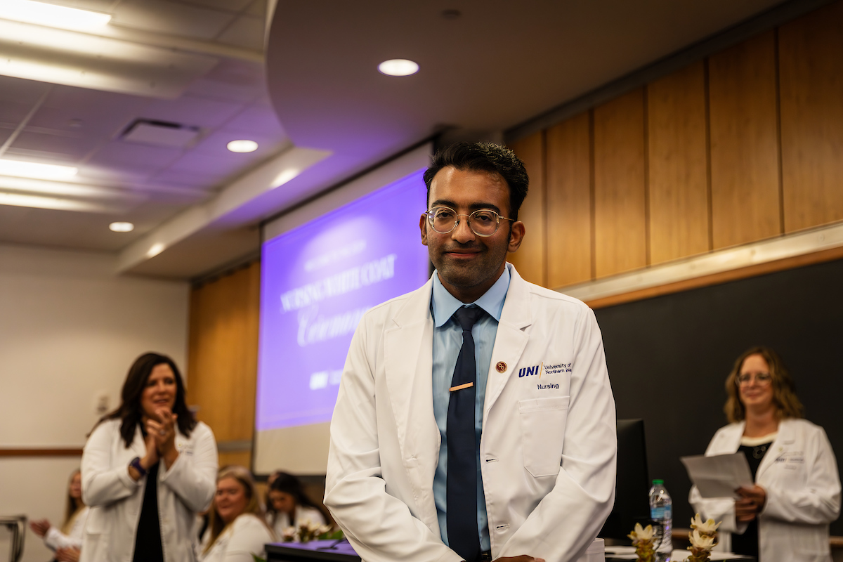 UNI student wears white coat for the first time