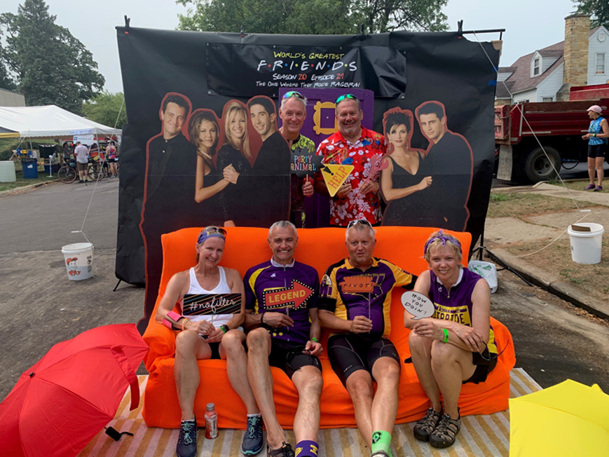 Hannasch RAGBRAI group posing with props and couch. 