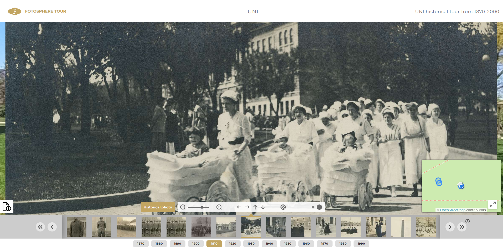 Historic image of women walking on UNI campus in 1910