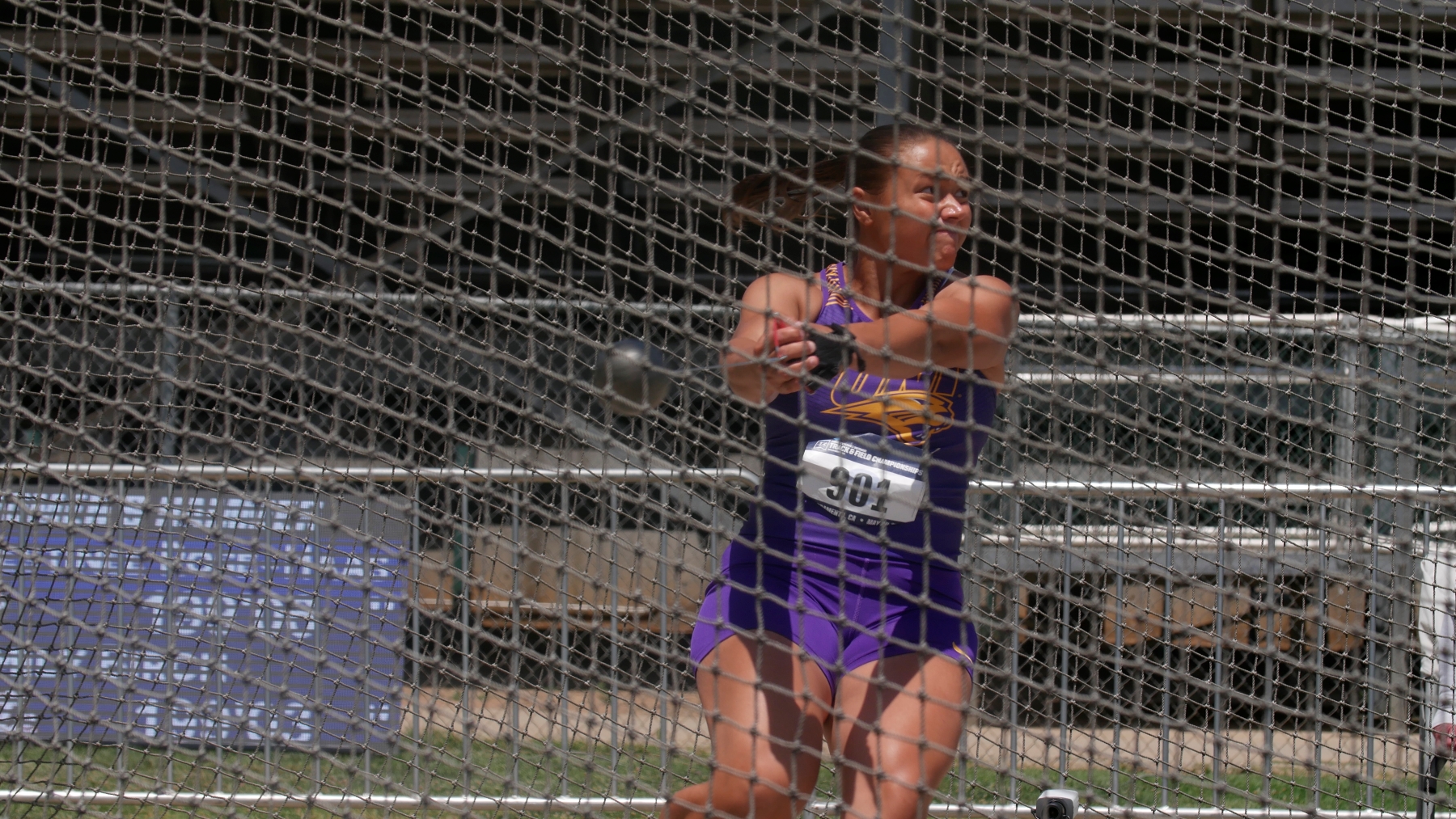 Mari Shavers in UNI uniform competing in women's hammer throw