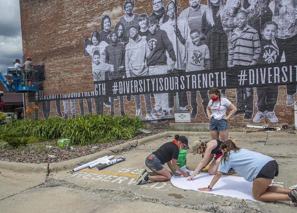 working on the mural