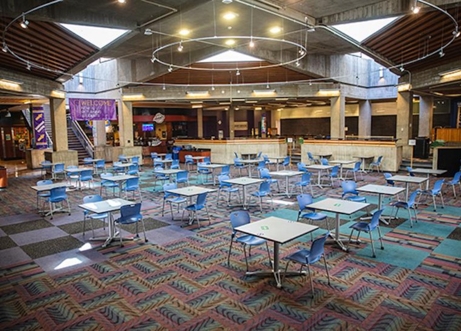 Tables spaced apart at a safe distance at the Maucker Union.
