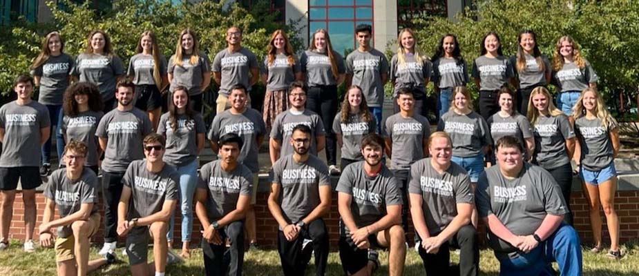 UNI student organization lined up in front of Curris Business Building