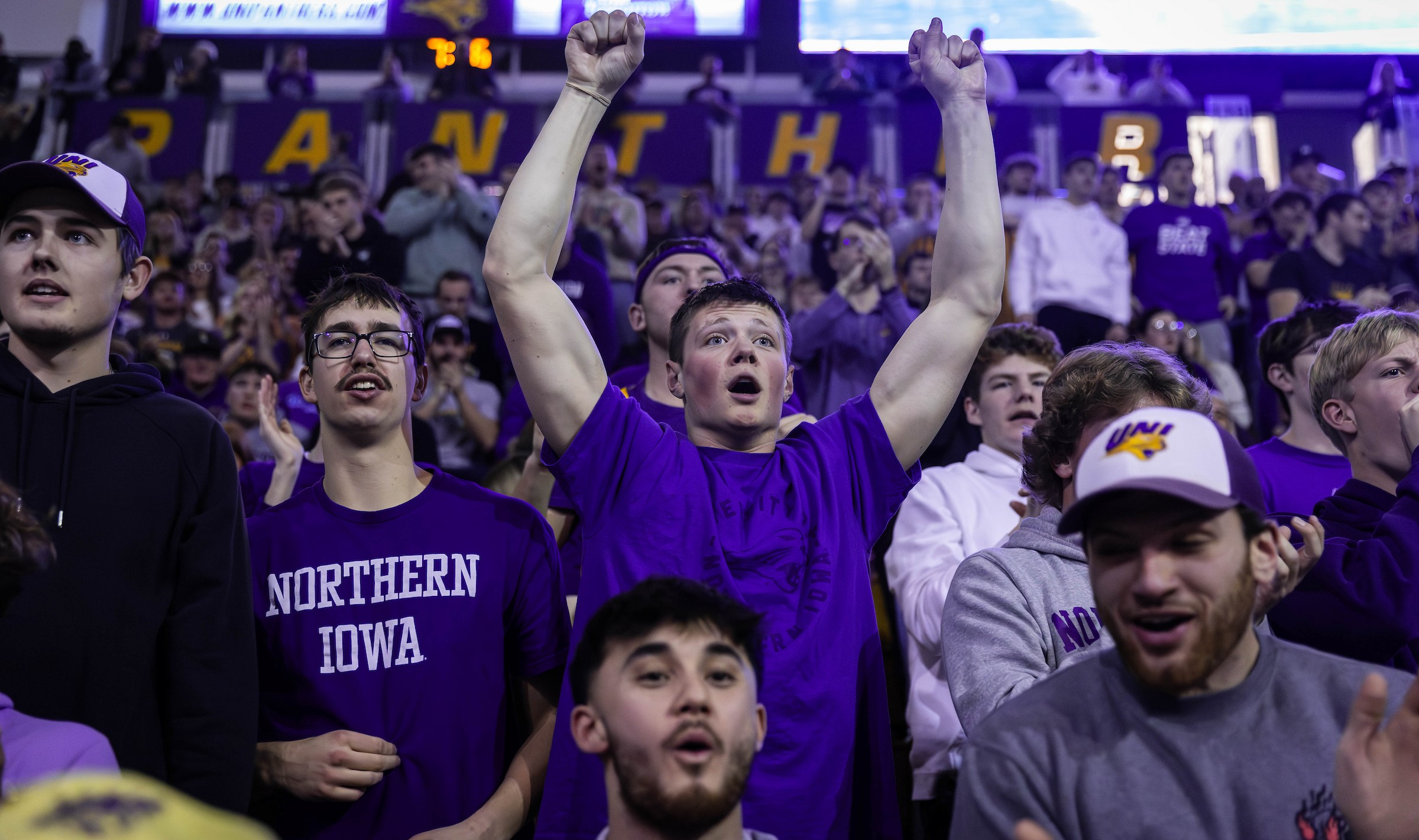 UNI students cheering on the Panthers in a packed McLeod Center