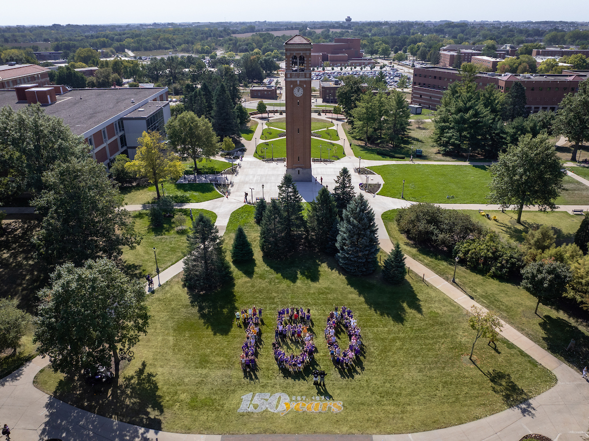 UNI campus with people spelling out 150
