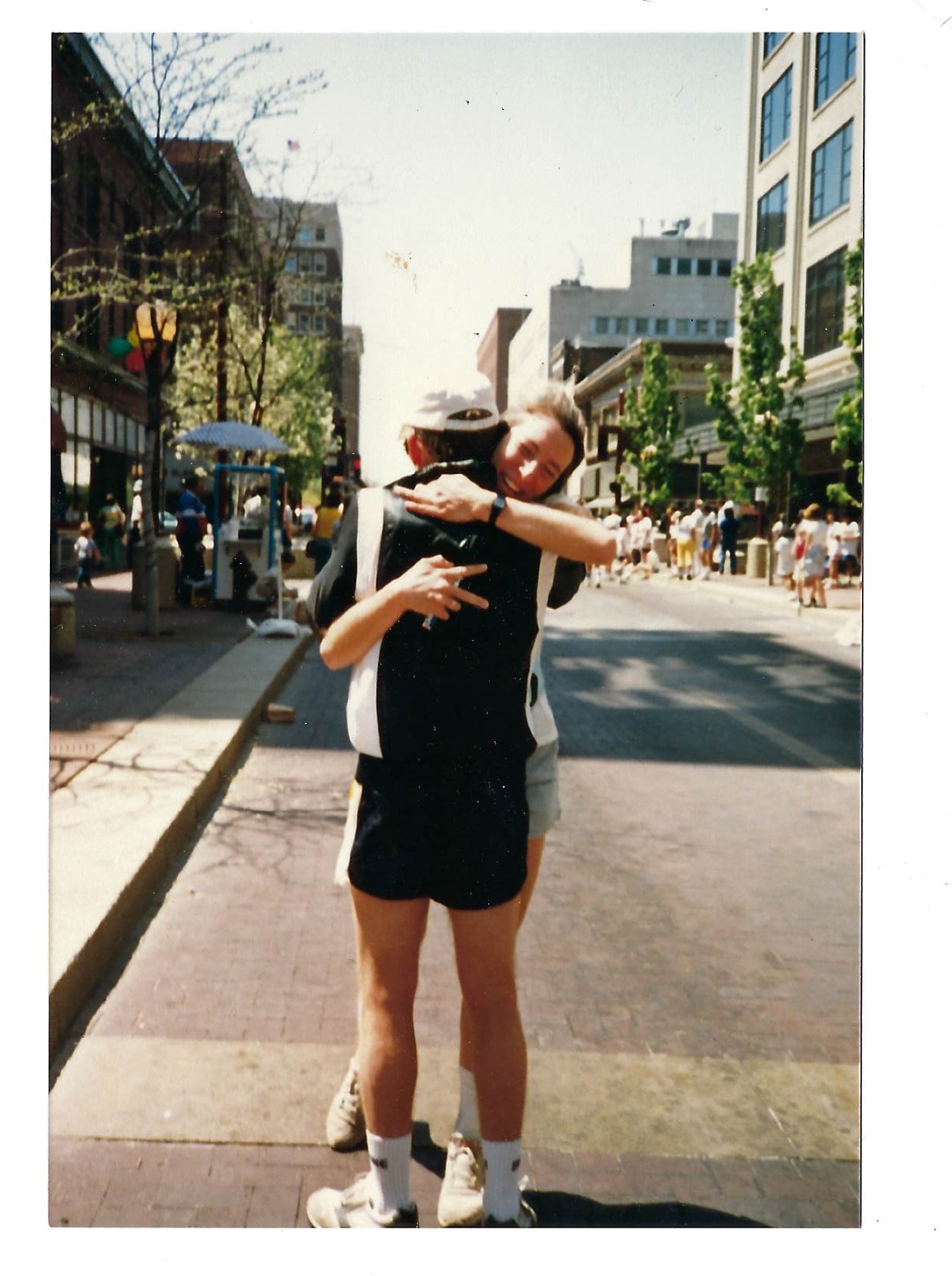 1988 marathon finisher hugging professor