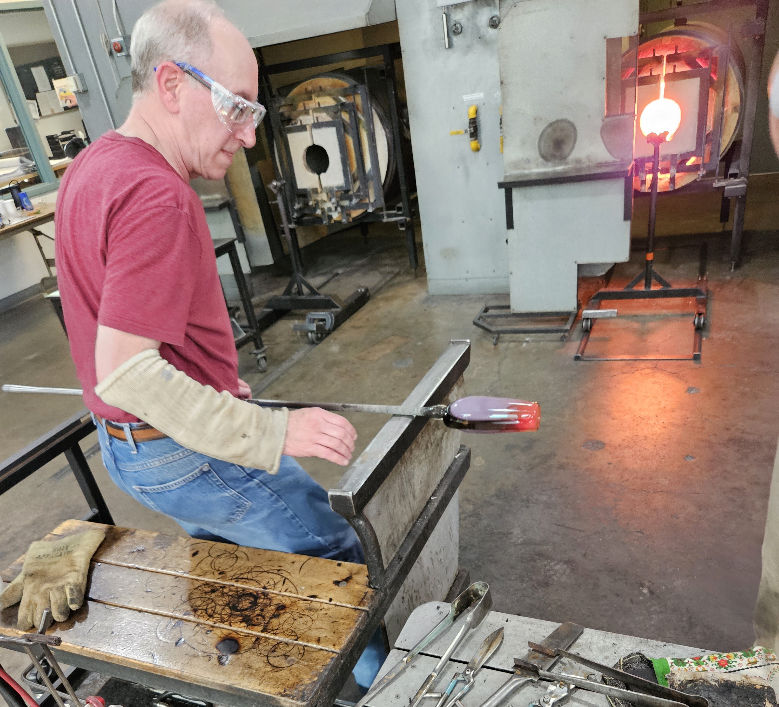 Bill Harwood blowing glass