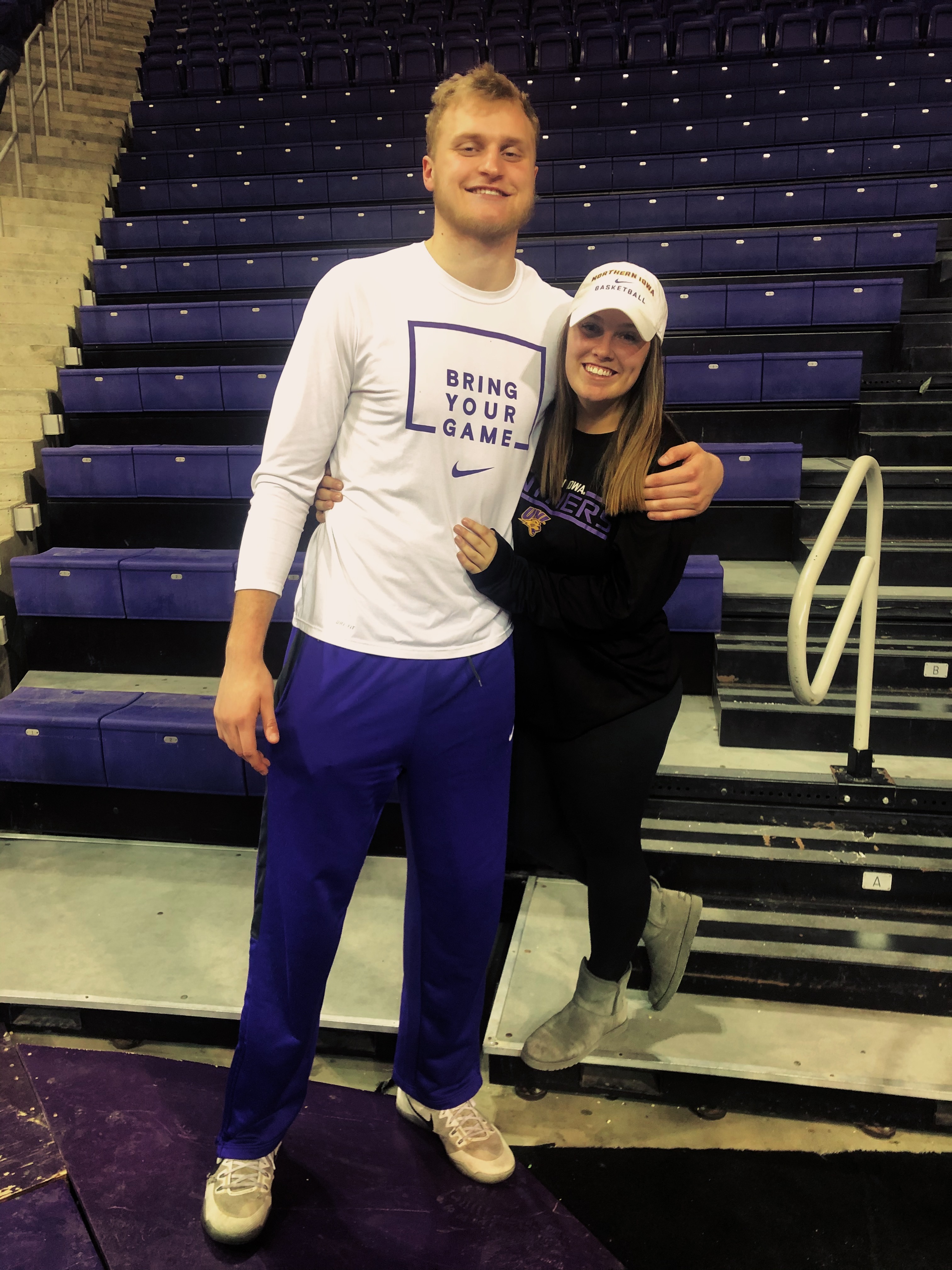Young couple at UNI basketball game