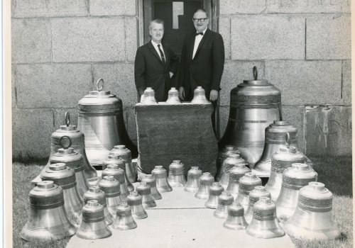 University leadership with Campanile bells