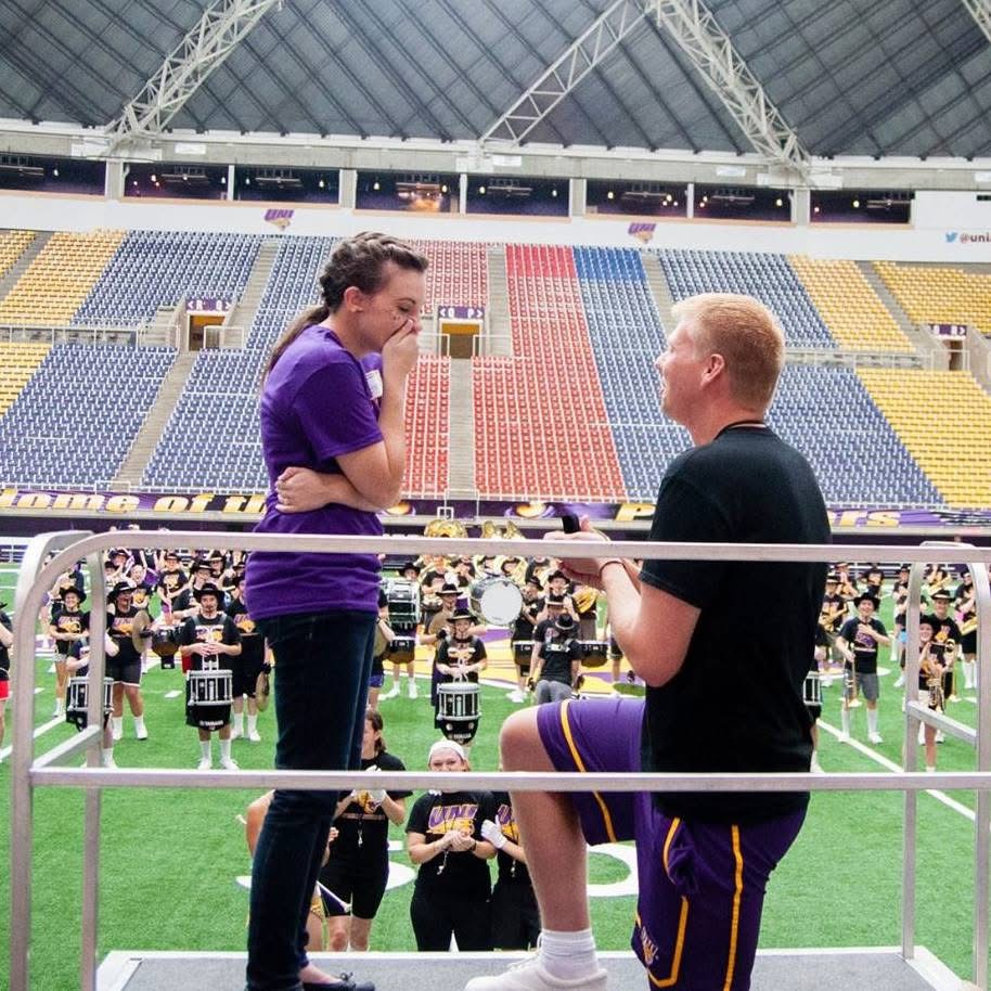 Couple getting engaged at UNI-Dome