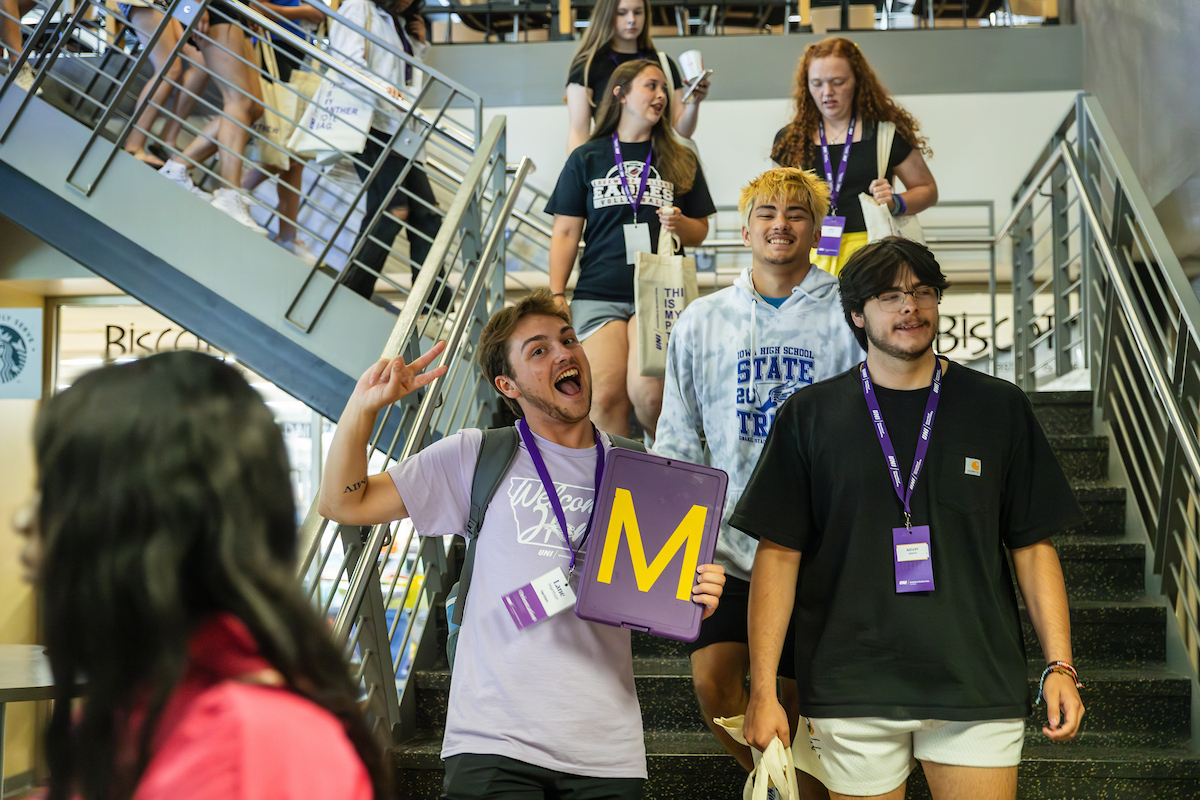 Students walk out of Piazza at UNI Orientation 