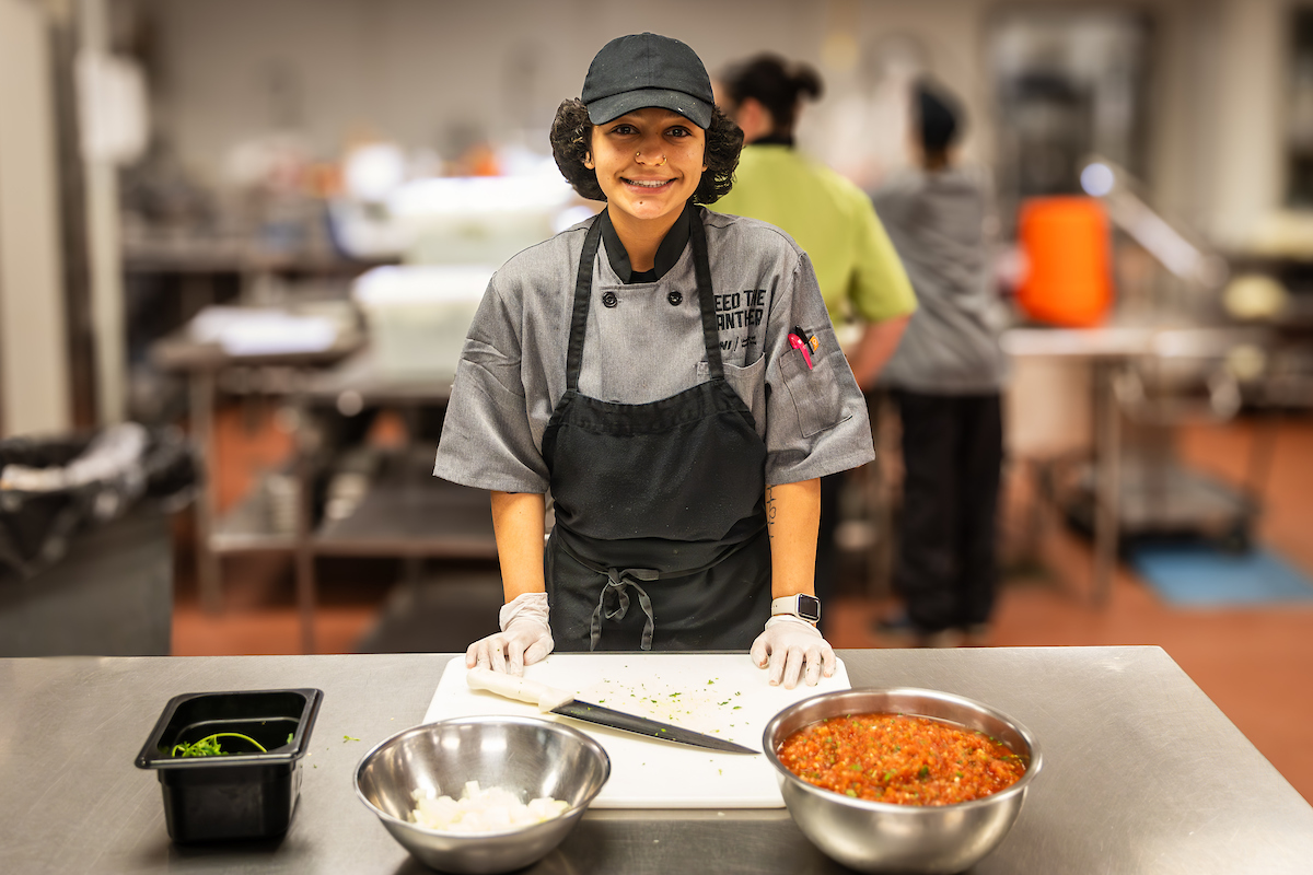 Isabella Carrillo preparing Carrillo salsa