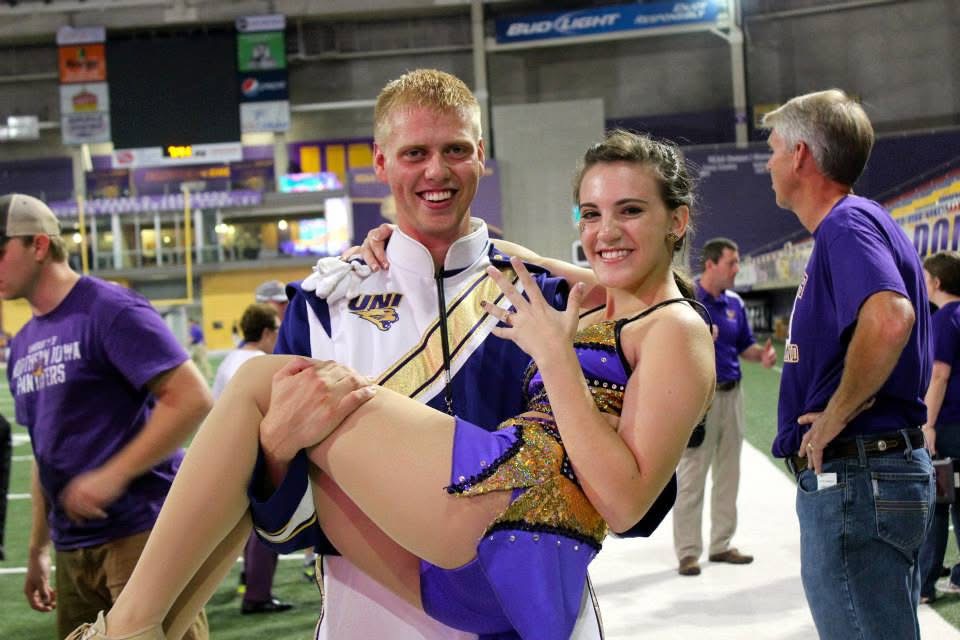 Young engaged couple in PMB gear