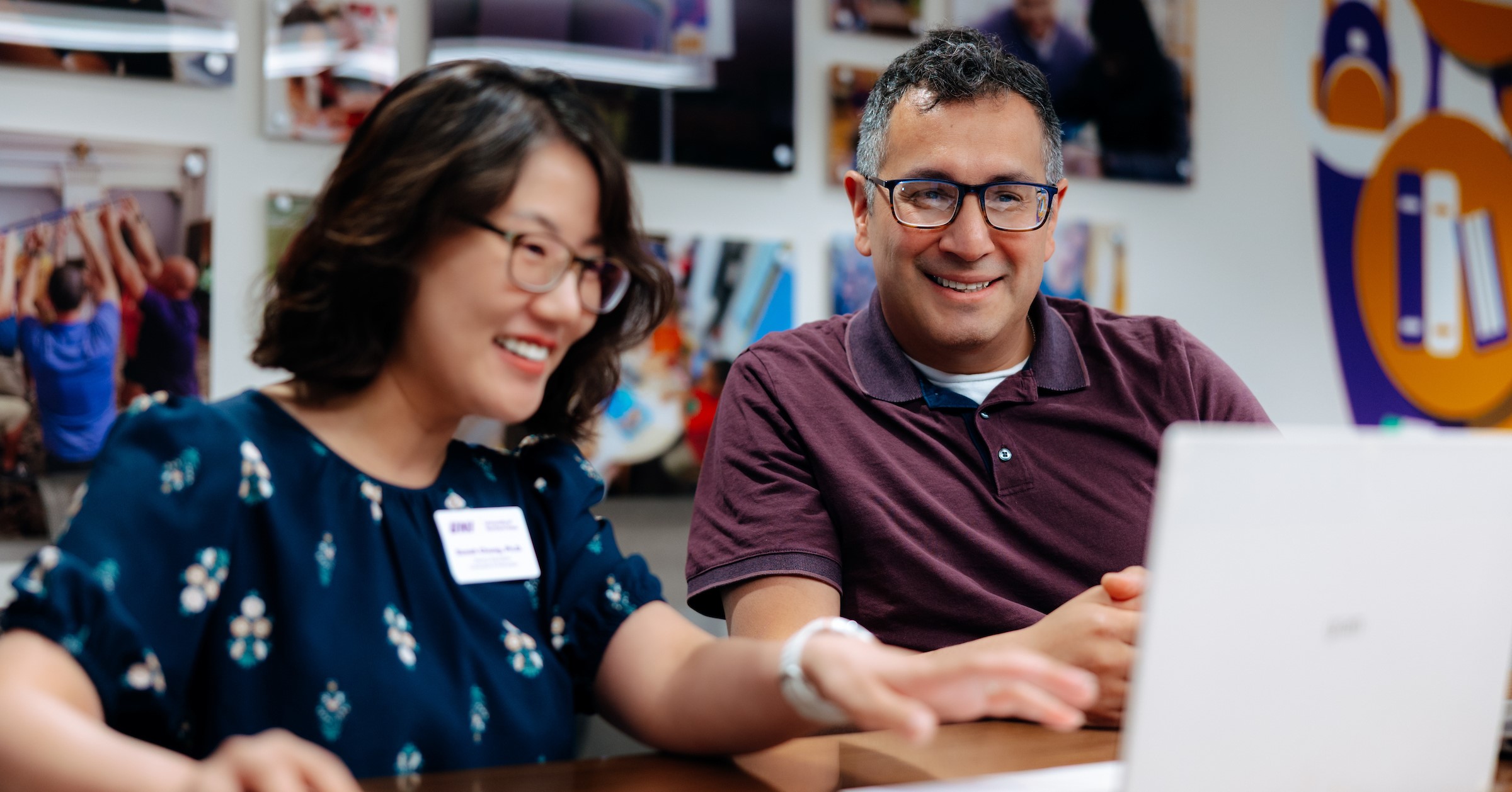 Faculty members Sunah Chung and David Hernadez-Saca work on new curriculum for the MAE in transformative education