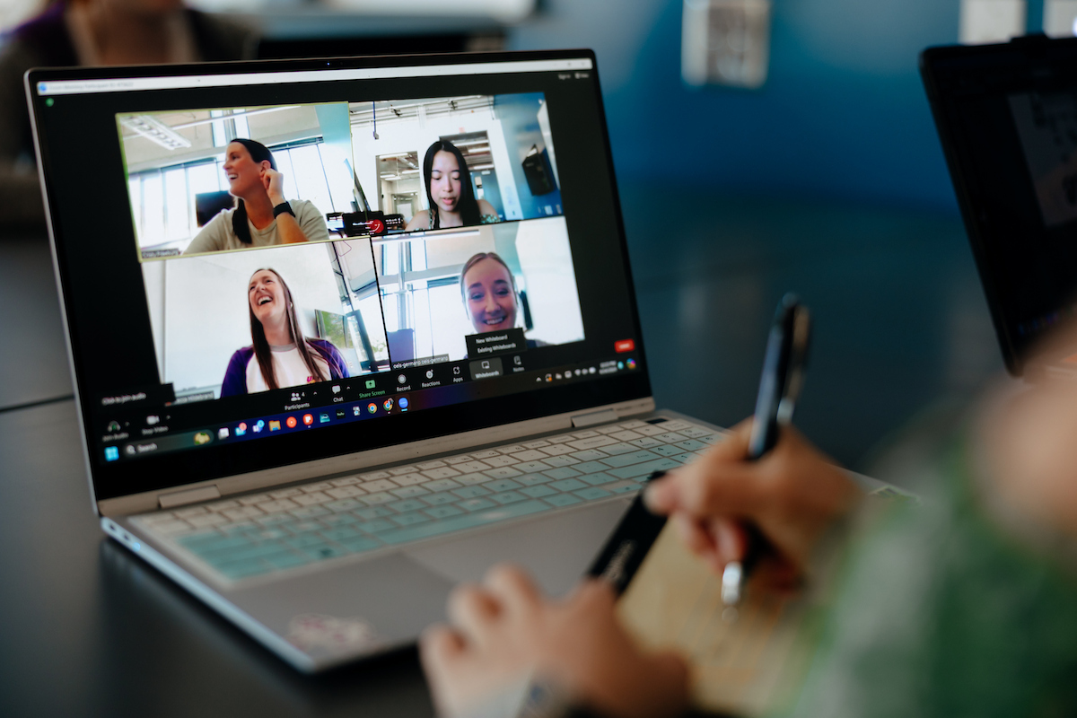 Student working on coursework via an online program