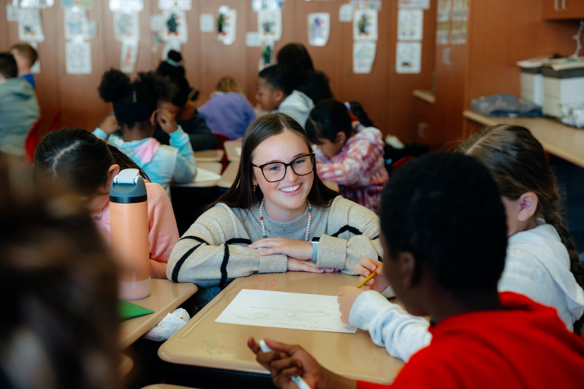 Student teacher in a classroom with her students