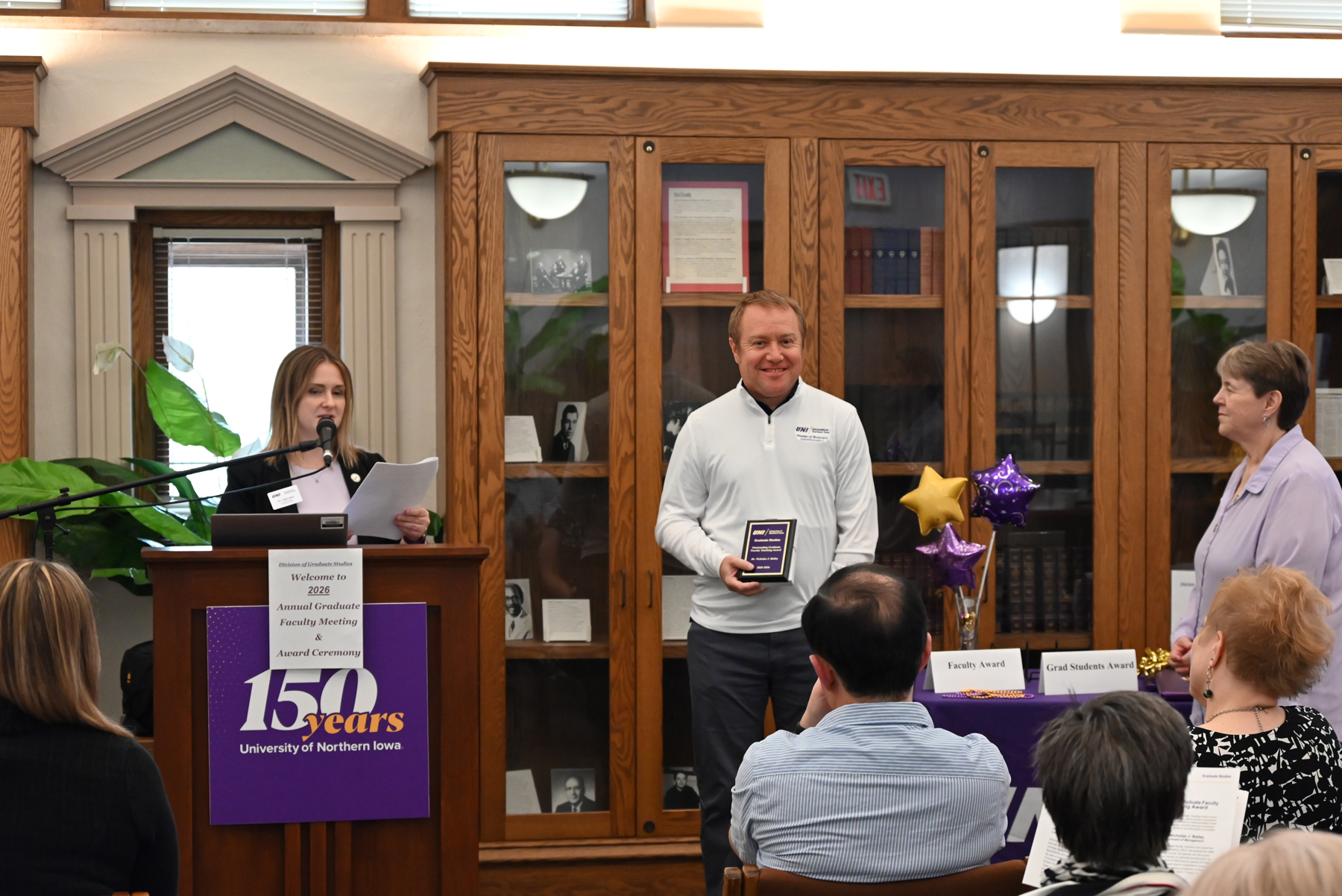 Julie Lanz and Stephanie Huffman present annual Graduate Studies Awards.