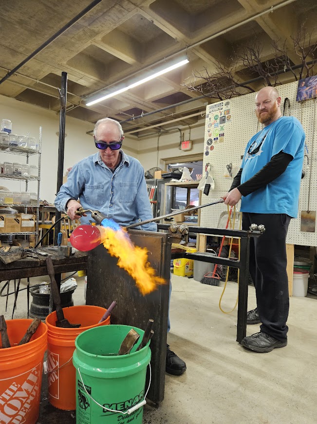 Bill Harwood using fluffy torch on blown glass