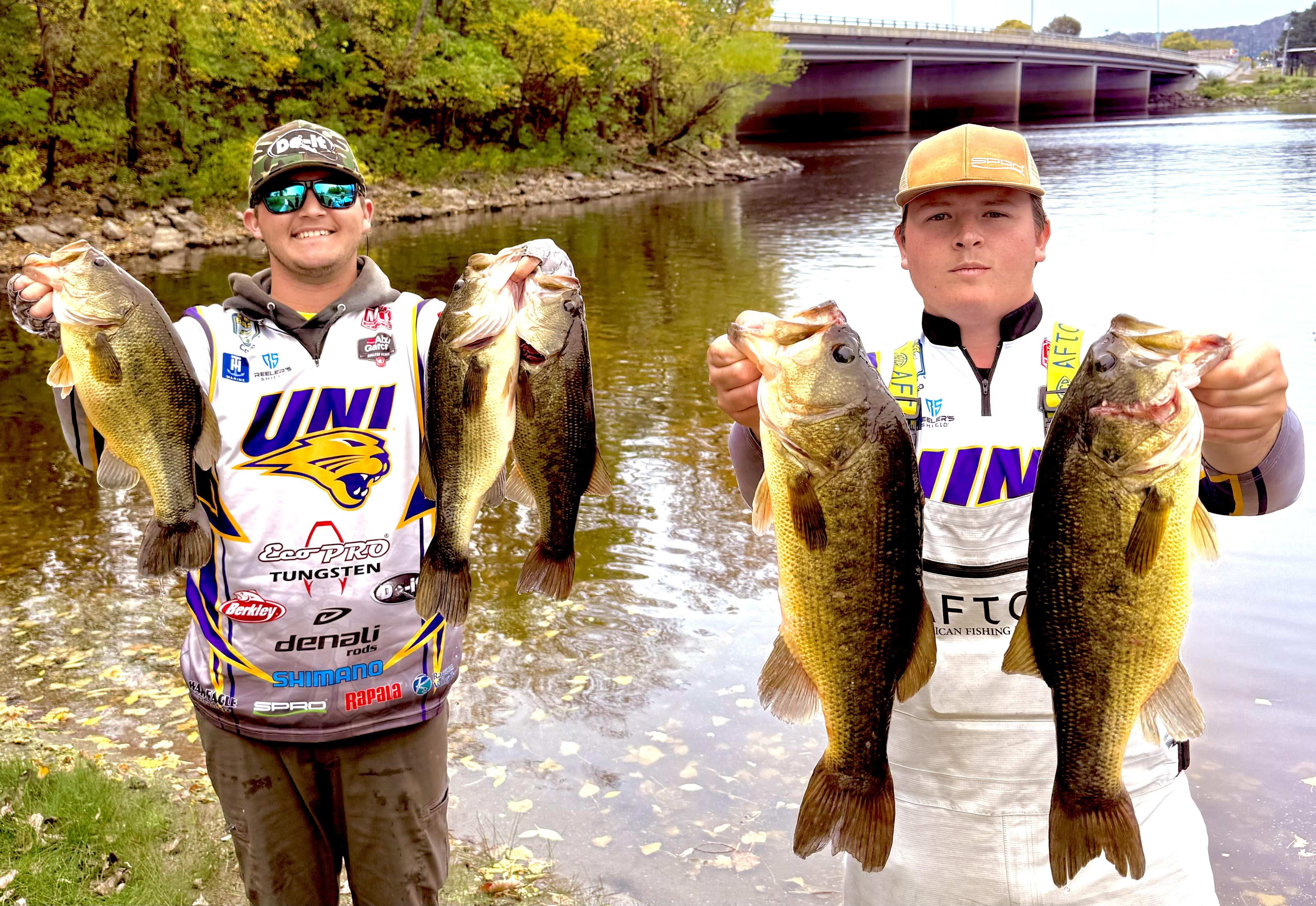 Cole Siebenahler and Jacob Lange showing off the fish they caught