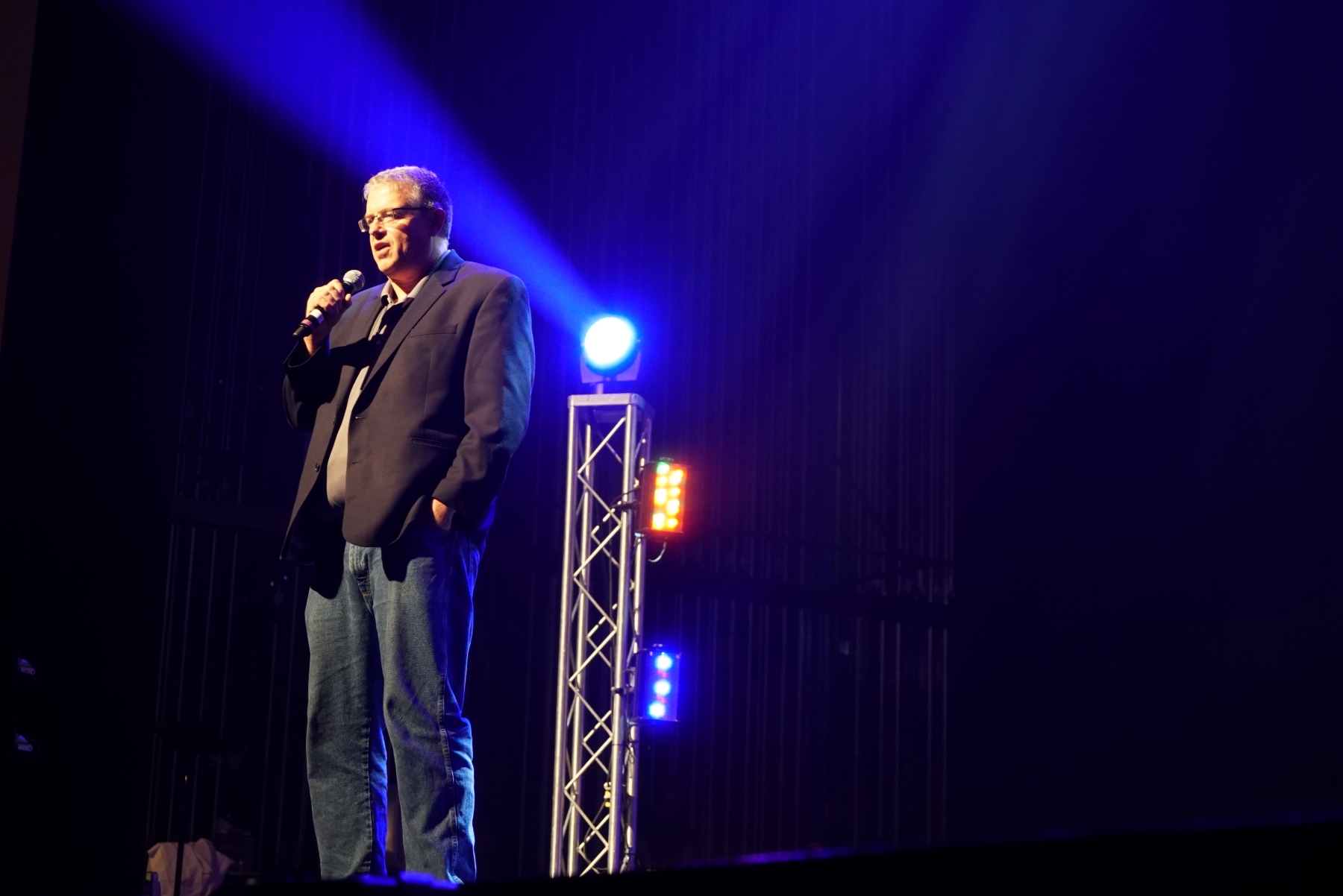 Steve Carignan speaking on stage at Gallagher event