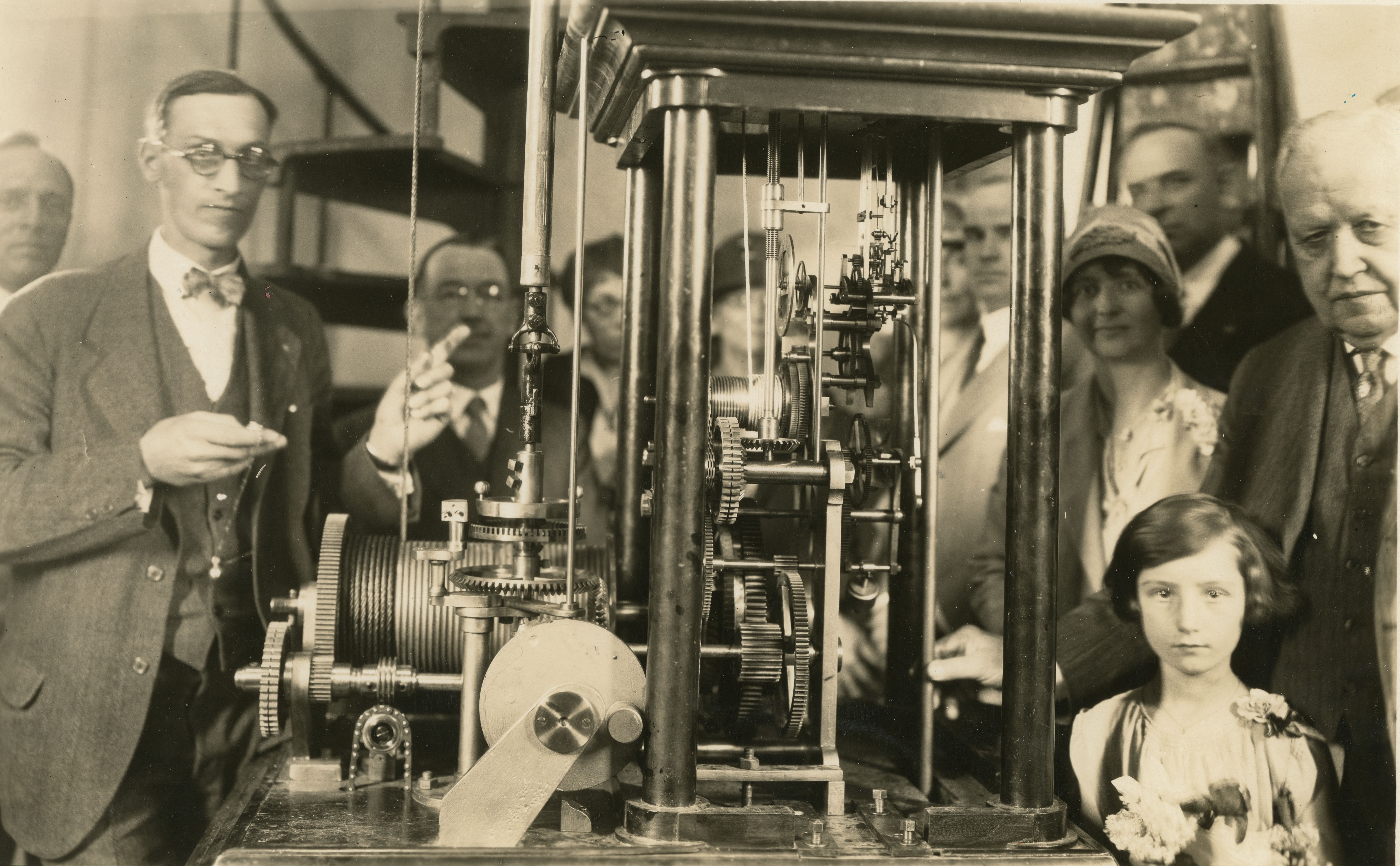 Charles Fasoldt's son, Dudley, starting the clock mechanism. 