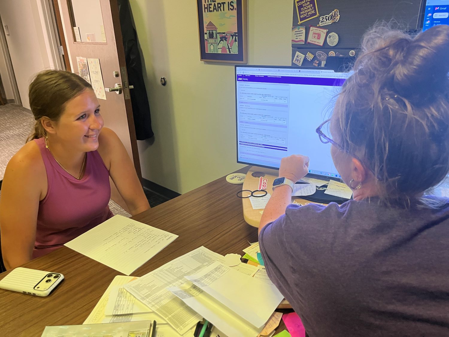 Advisor working with student 