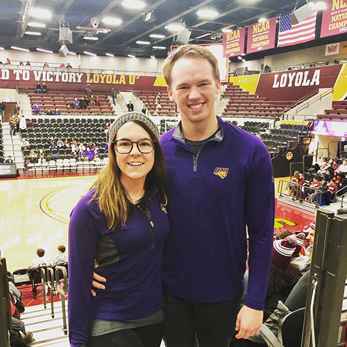 Scholtes and Dykstra at a UNI basketball game