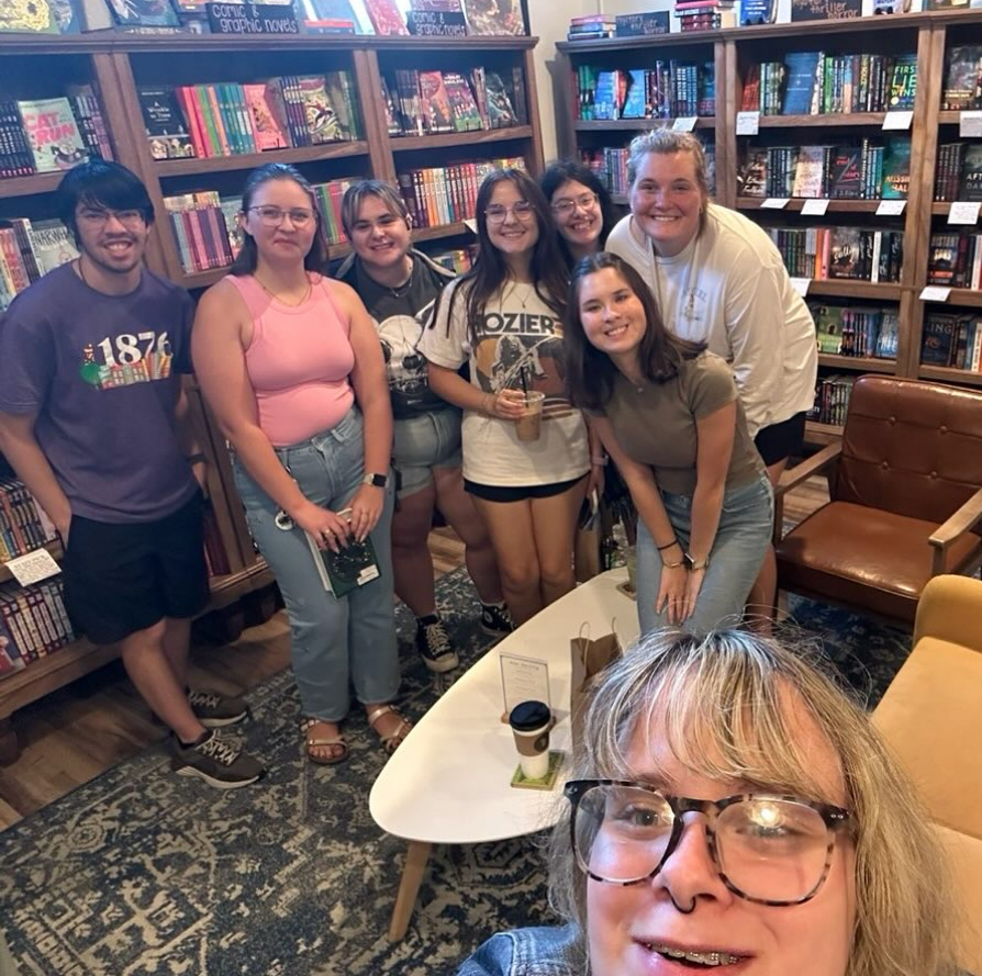 Students in the UNI Book Lovers Club gather at local bookstore, The Nook.