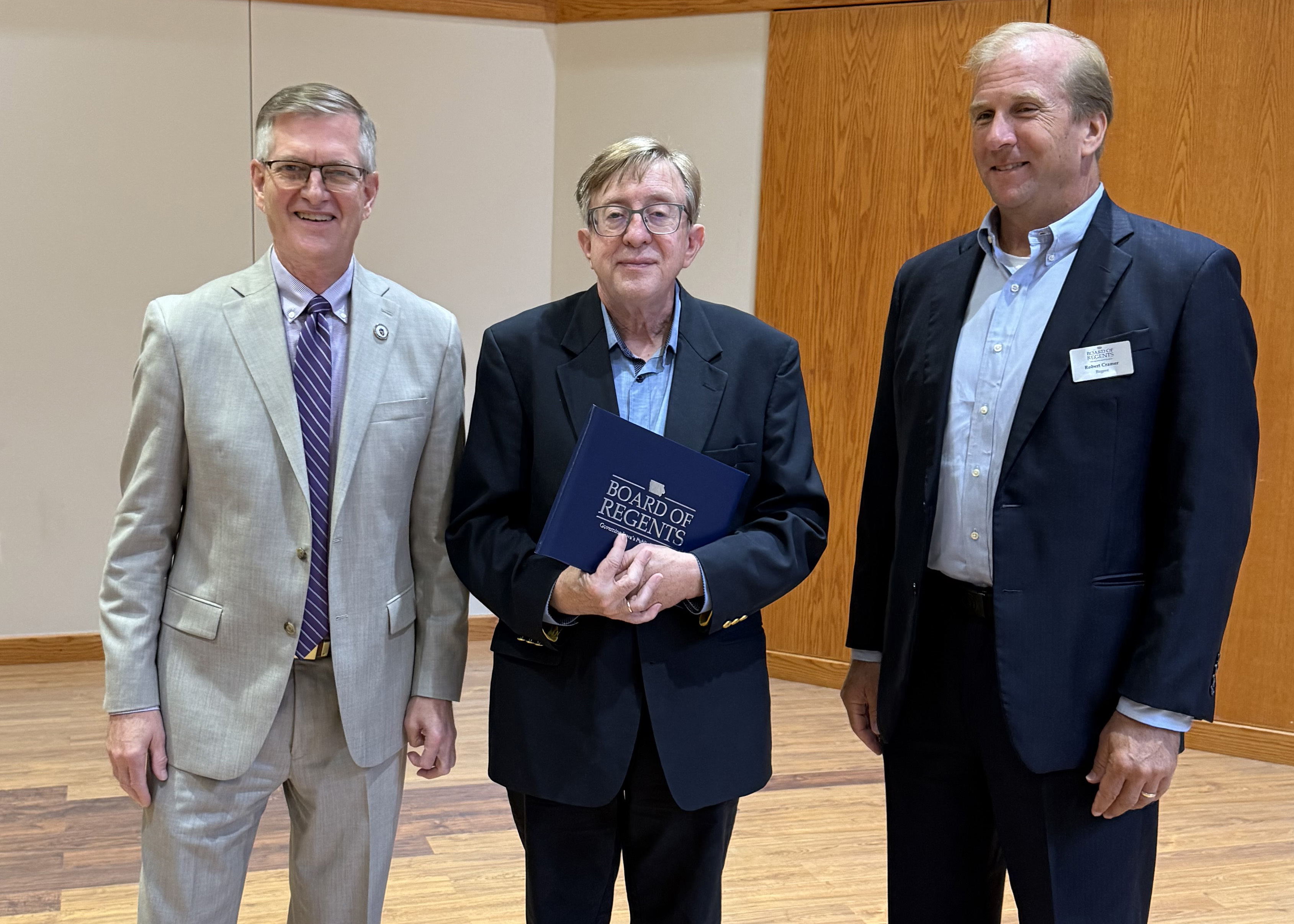 Thomas Hockey accepting Regents Award for Faculty Excellence