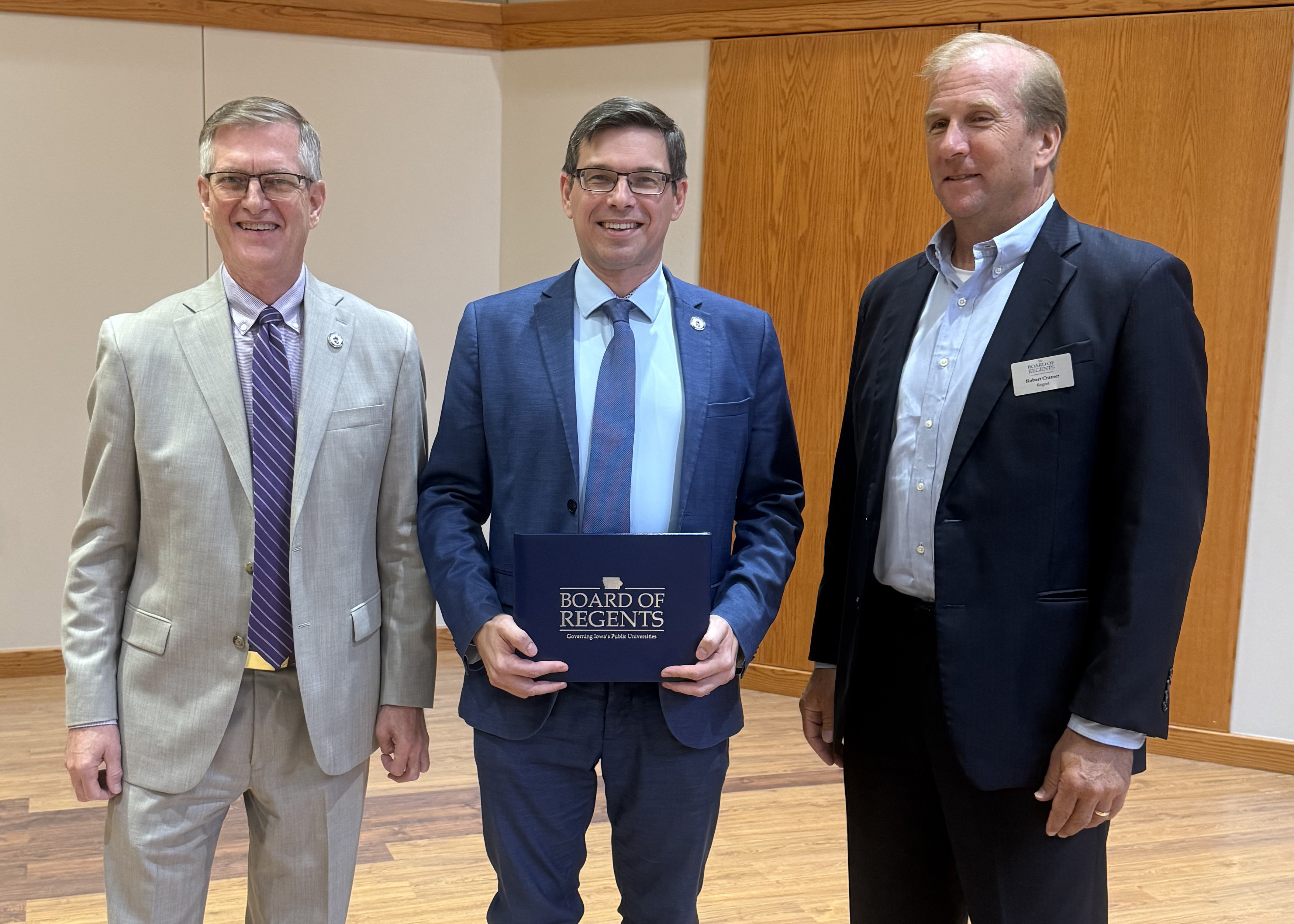 Andrey Petrov accepting Regents Award for Faculty Excellence 