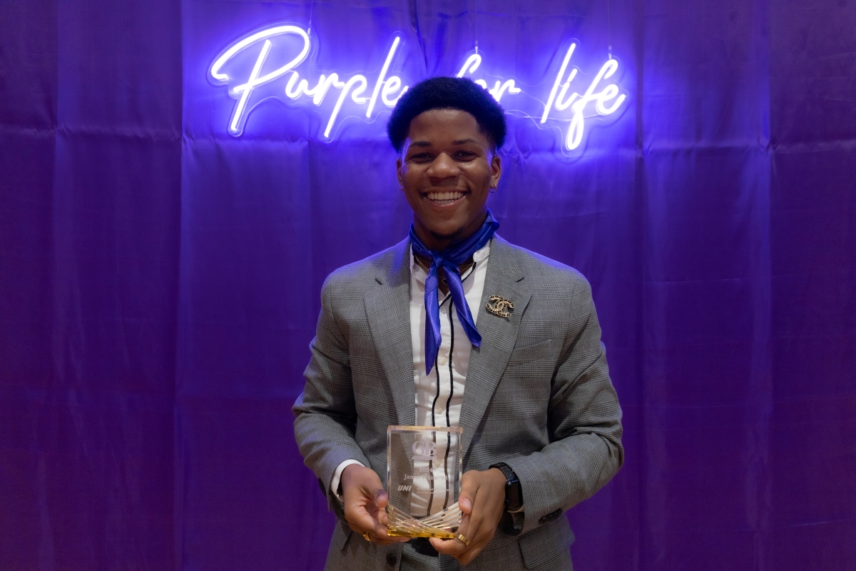 Jamal White holding GOLD & Bold award