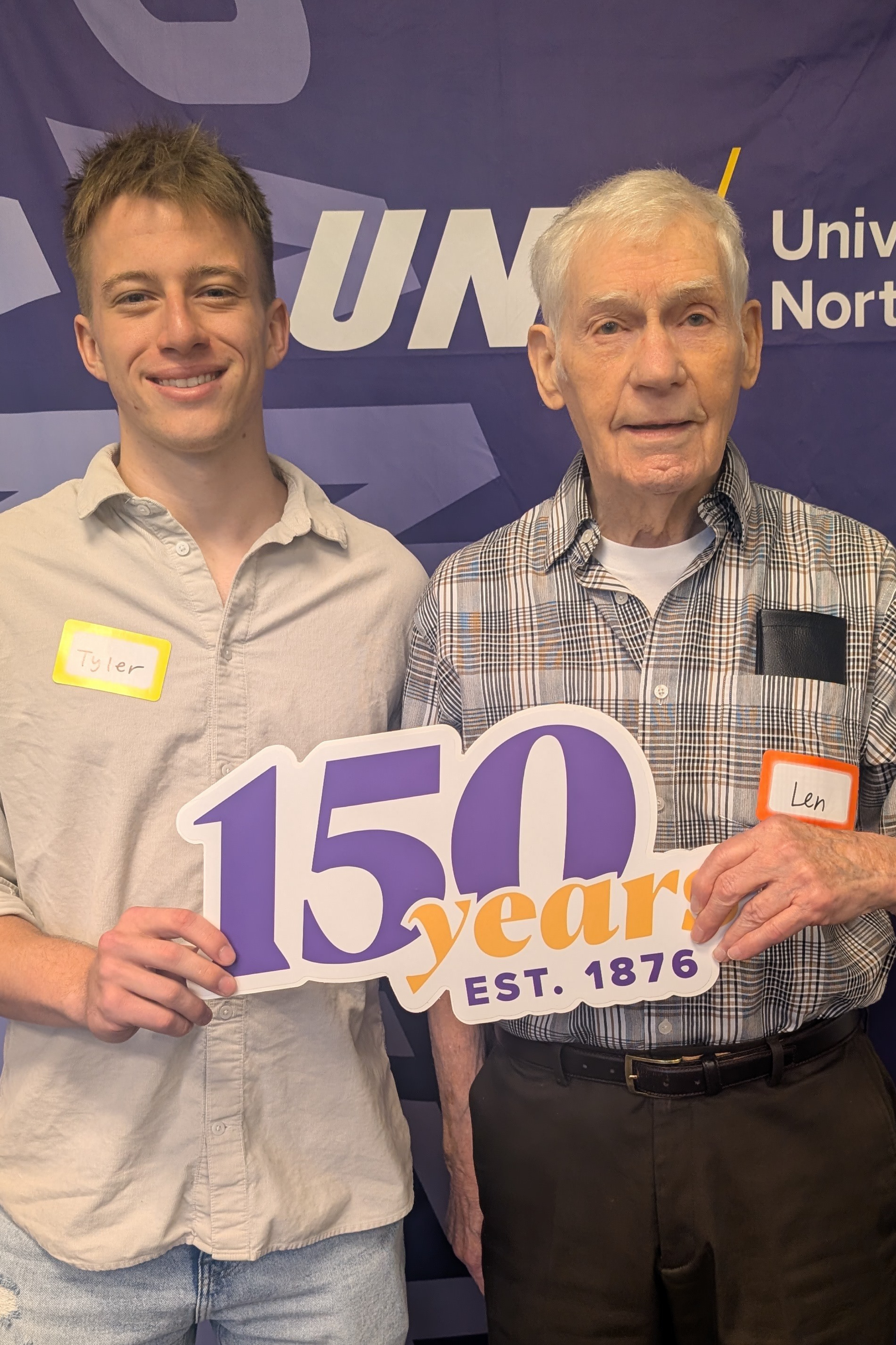 Student and alumni working on memory project for UNI 150