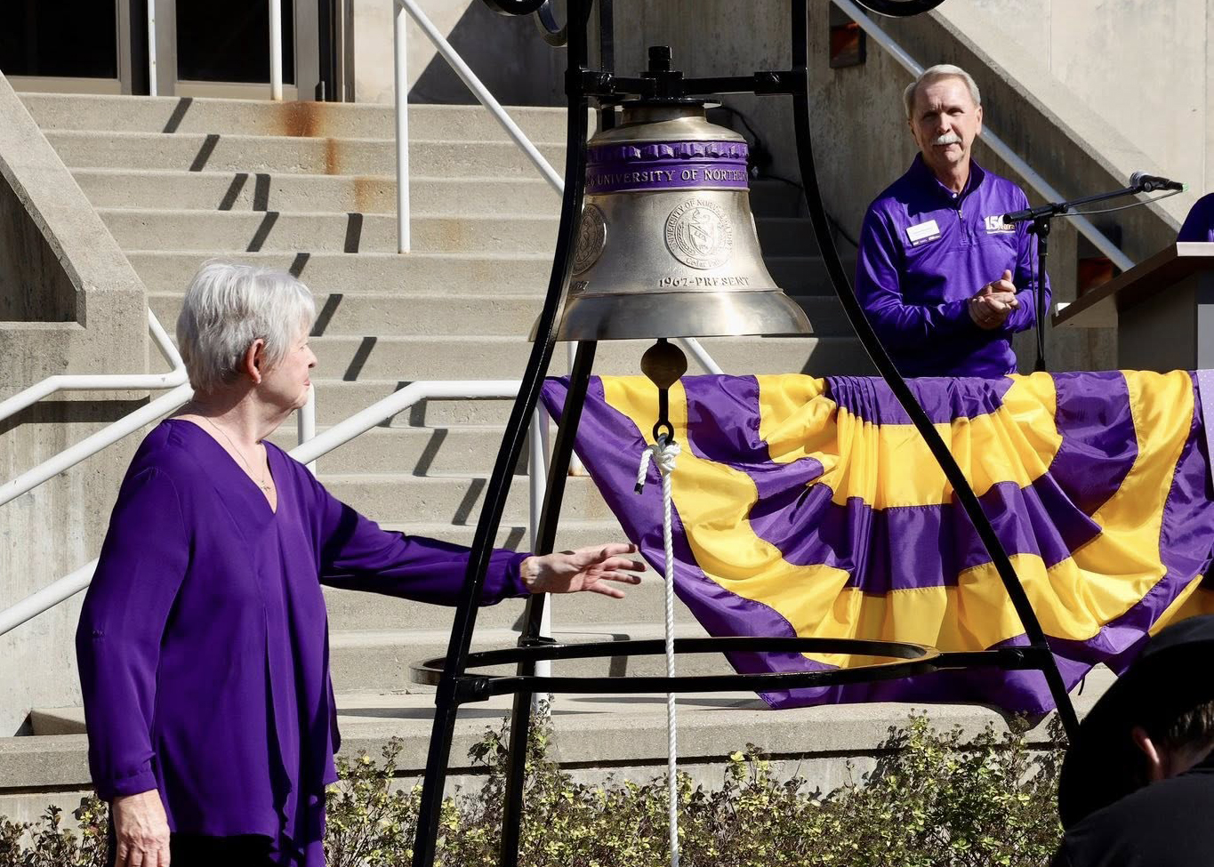 Noreen Hermansen ringing Sesquicentennial Bell