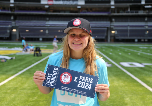 Olivia Chambers with Paralympics "ticket"