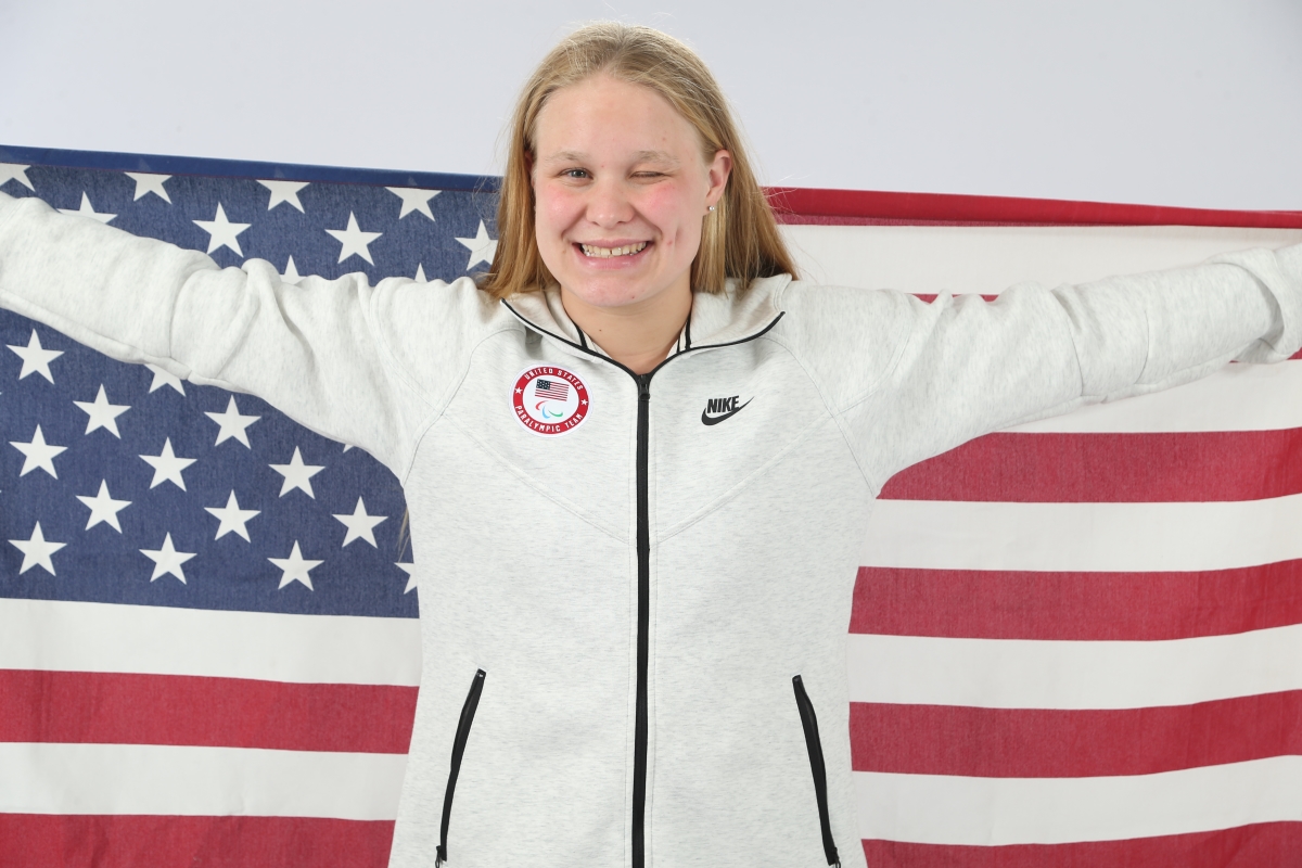 Olivia Chambers holding American flag