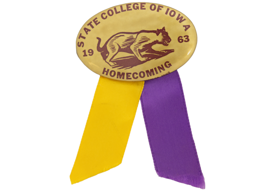 A gold 1963 State College of Iowa Homecoming pin with a panther and purple and gold ribbons
