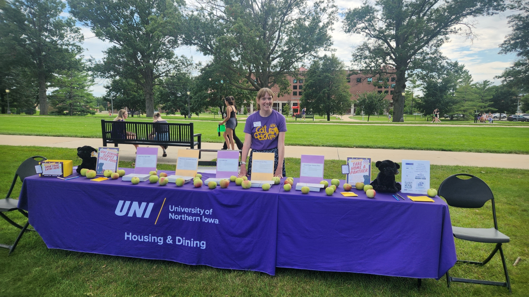 Stacey Runde tabling outside for UNI Housing & Dining