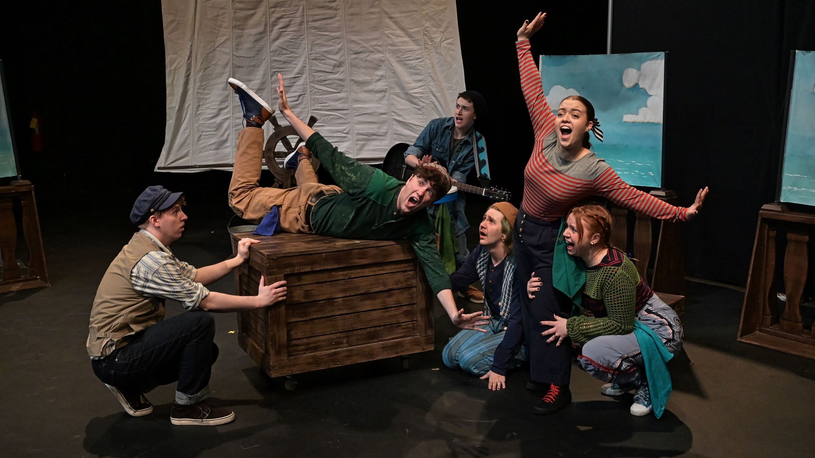 Students posing for a show that they are  in