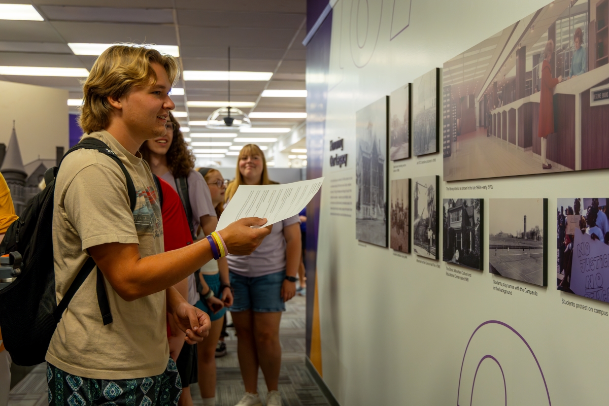 Students walk through Sesquicentennial Exhibit