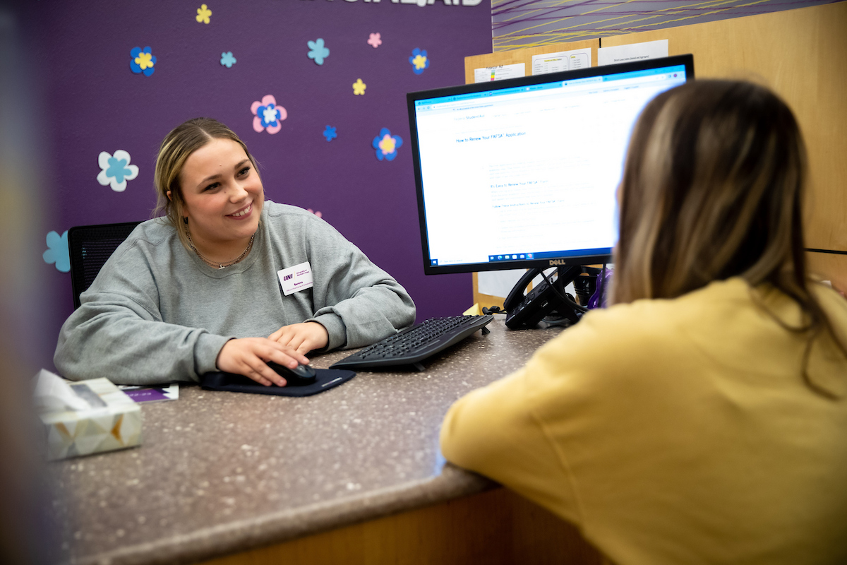 Student meeting with someone in the financial aid office