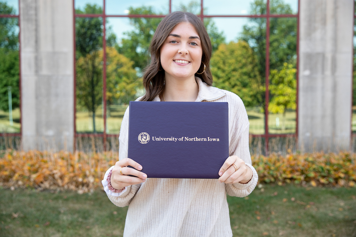 Jenna Meyer in front of Curris Business Building