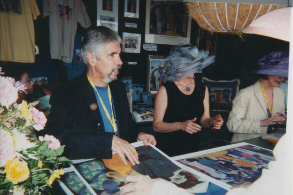 Gary Kelley signing his art work. 