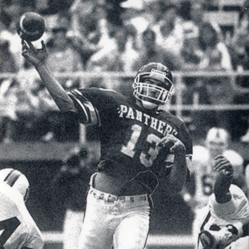 Kurt Warner in 1994 throwing a football. 
