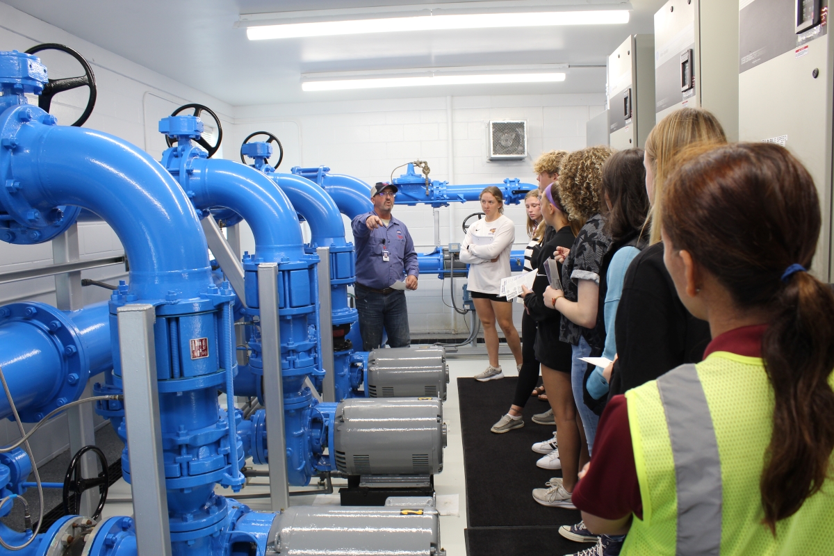 Students inside water treatment facility