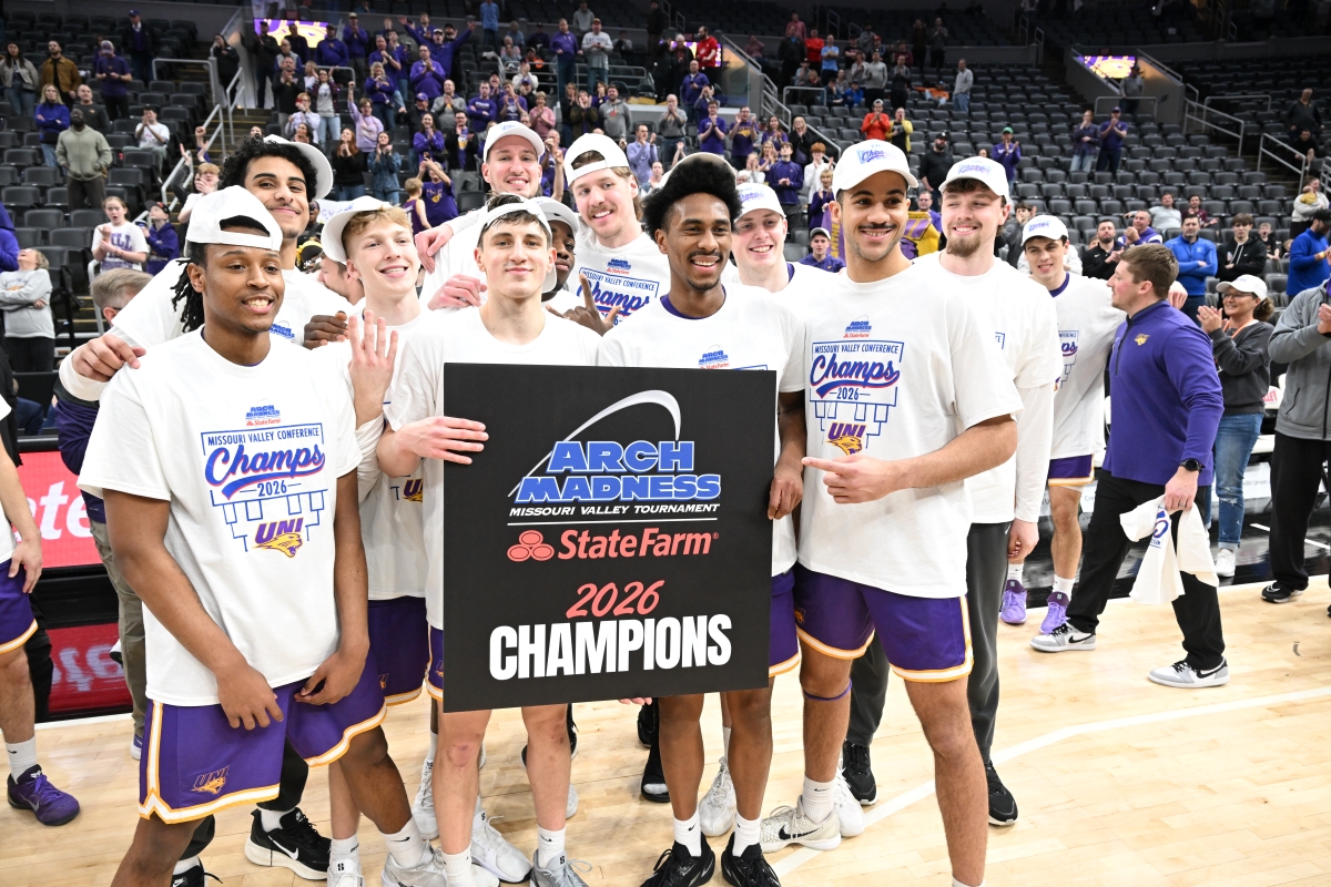 Panther men's basketball team holding sign that says Arch Madness 2026 champions
