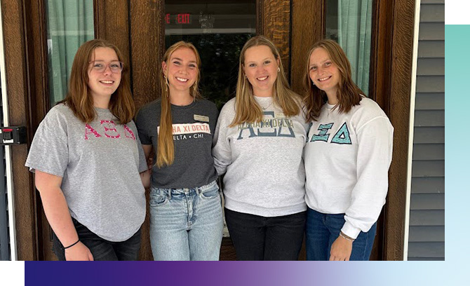 Alpha Xi Delta members pose for a photo