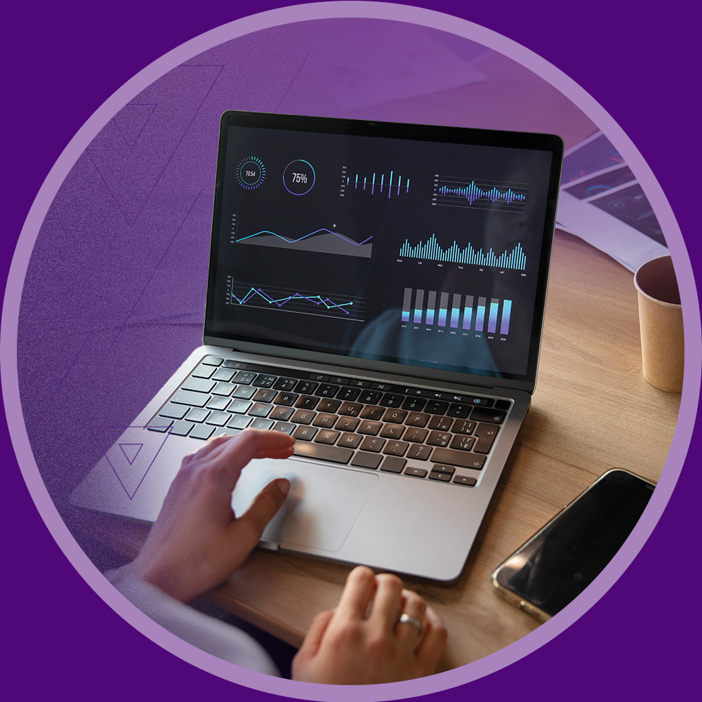 Laptop with charts on screen